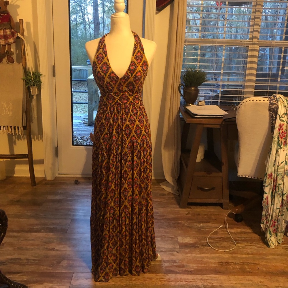 A tiny rip but could barely see it. Message me for more pics if interested.